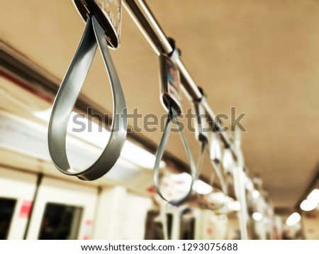 The background blurred the handle on the train in Bangkok, Thailand.Vintage colors picture,soft focus.
