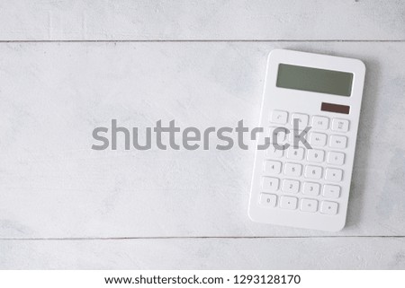 A studio photo of a business calculator