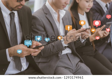 Group of friends or Business people, watching or using smart mobile phones together- People addiction to new technology trends - Concept of Start up future, tech, Ai, social and friendship,Team