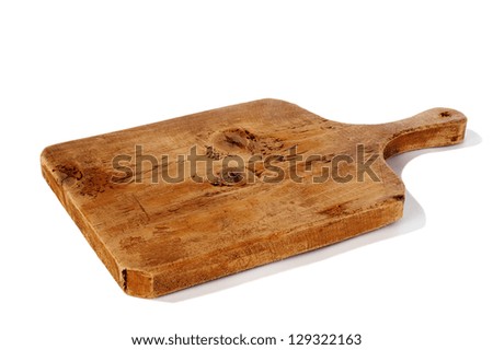 Old  wooden cutting board Royalty-Free Stock Photo #129322163