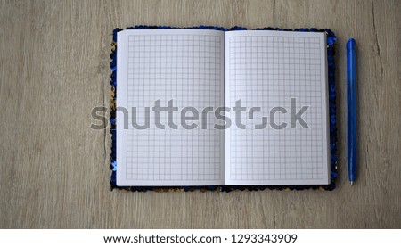 Blank pages in Notepad. Textured gray background.
