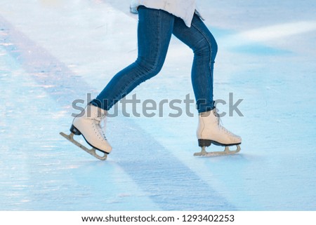 woman ice skate on the rink
