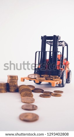 The loader loads the coins. Concept: wealth
