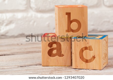 Wooden toy Blocks with the text: abc Royalty-Free Stock Photo #1293407020