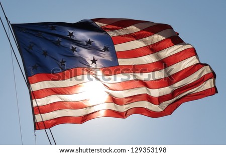 Proud American Flag Waving Royalty-Free Stock Photo #129353198