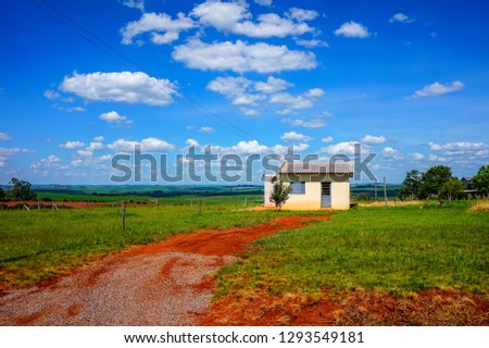 Building alone in the middle of the field at the south Brazillian countryside