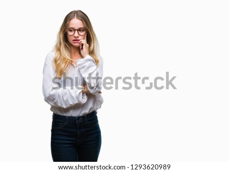 Young beautiful blonde business woman wearing glasses over isolated background looking stressed and nervous with hands on mouth biting nails. Anxiety problem.