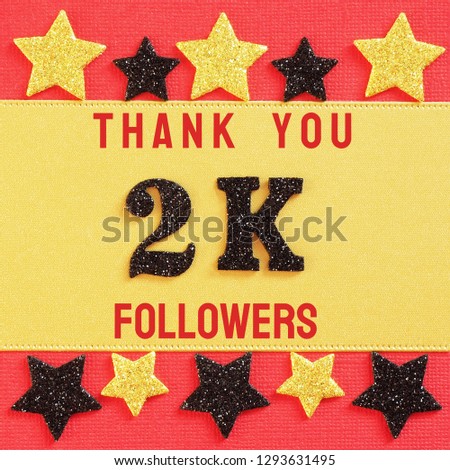 Thanks 2000, 2K followers. message with black shiny numbers on red and gold background with black and golden shiny stars for social network friends, followers,
likes
