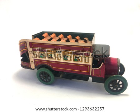 Red bus toy.Vintage bus on white background