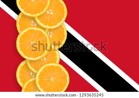 Trinidad and Tobago flag and citrus fruit slices vertical row