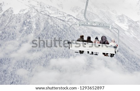 Chair ski lift among the mountains