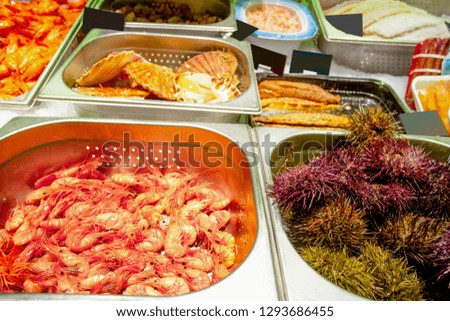 A variety of seafood on the counter