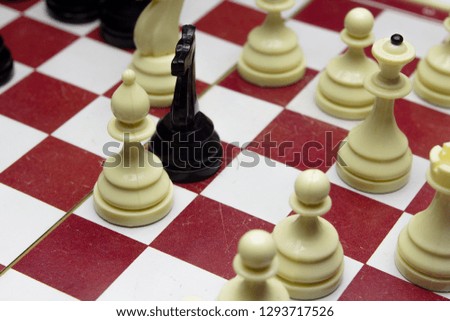 Chess pieces on a chessboard closeup