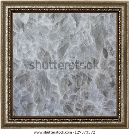 unique texture of natural stone with old antique metal frame - marble, onyx, opal, granite