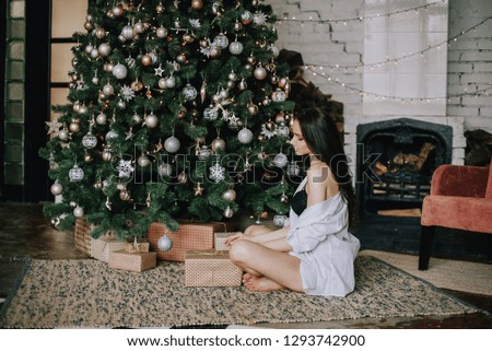 girl at the christmas tree