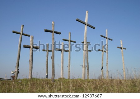 Group of crosses on a hill of blue sky