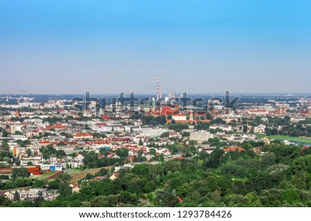 Cityscape of Krakow by blue sky. City view from Kosciuszko Mound, Poland