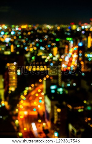 Aerial view of road in Tokyo city, cityscape skyline defocus, blur light.

