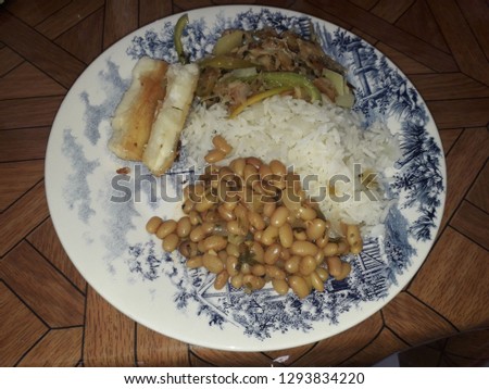Food dish in Recife. Manioc. Bean. Rice. Cod with rice and beans. Typical dish of Recife. Brazillian tipical food.