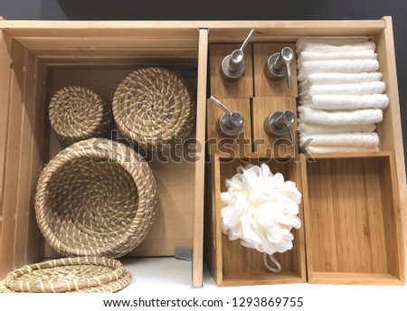 Bath cosmetics and accessories in drawers