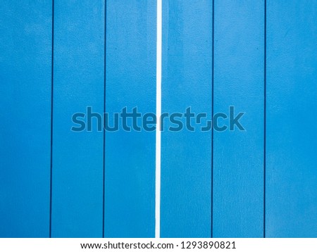 white line on old vintage blue wooden for background