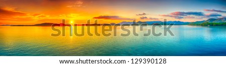 Sunrise over the sea.  Panorama Royalty-Free Stock Photo #129390128