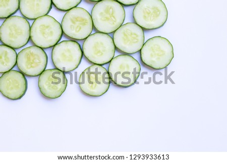 Cucumber slices on white background. Copy space