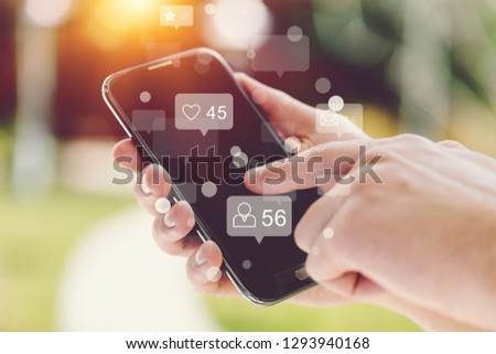 Young women using smart social media concept phones,Social media,social network concept with smart phone - Image
    
    - Image
