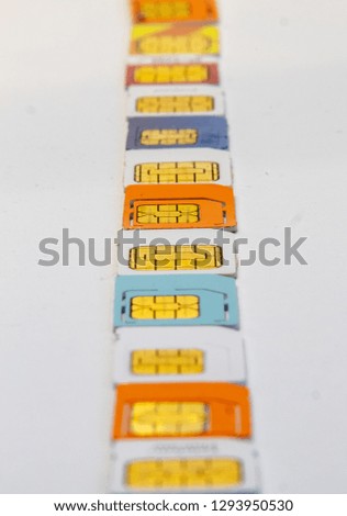 View of many sim cards different formats and colors on white background