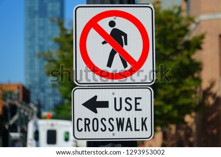 No pedestrians use crosswalk, sign                              
