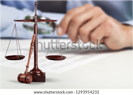 Justice Scales and female hands. Justice concept