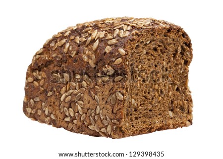 Healthy dark rye bread - made from many different healthy ingredients like pieces of soy, rye and wheat flour, sunflower seeds and barley. Isolated on white.
