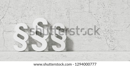 Symbol of Law and Justice - Paragraph / section sign on the concrete wall Royalty-Free Stock Photo #1294000777
