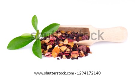 Fruit tea with hibiscus, apple, raspberry, rose petals and dog-rose, isolated on white background.