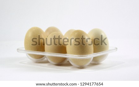 chicken eggs in box isolated on white  background - Image jpeg