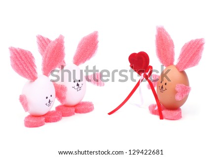 Easter crafts made of shell egg. Rabbit with pink ears isolated on white background. postcard