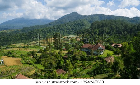 a contryside view in the foothills of the twin mountain Gede and Pangrango national park in Bogor, Indonesia