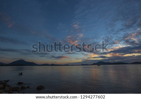 The background of the blue sky, natural wallpaper, the lake, has the atmosphere of the wind and the beautiful morning sun, seen during travel