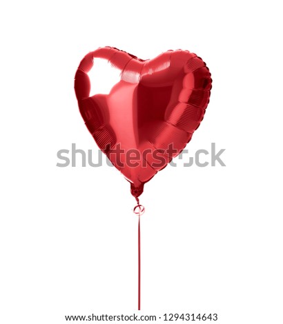 Metallic red heart balloon object for birthday party or valentines day isolated on a white background