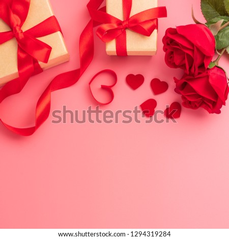 Giving present and celebration concept at Valentine's day, anniversary, mother's day and birthday surprise on pink background, copyspace, topview