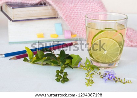 herbal healthy drinks honey lemon health care for sore throat with dictionary book of student for study decoration on white table 