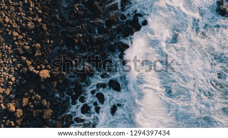 Waves crashing in Los Angeles Aerial Royalty-Free Stock Photo #1294397434