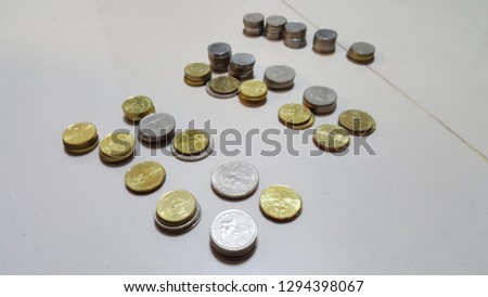 Malaysia's coins, each stack having 1 ringgit value, 25 ringgit total in picture