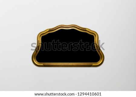 Golden picture frame with rounded shapes