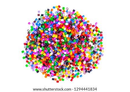 Mix color plastic particles children's mosaic. Studio Photo 