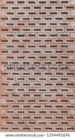 Modern brick wall with decorative classic running bond and cement mortar symbol, Red wall made of special rustic bricks