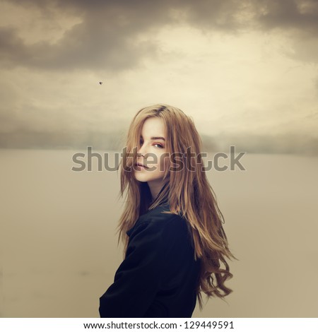 sad hipster girl outdoors Royalty-Free Stock Photo #129449591