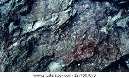 Deep color stone view like big in sun light or with out sun or artificial light.
the small stone view like big hills
close view of stone and hills
hills environment in small stone view
 hills