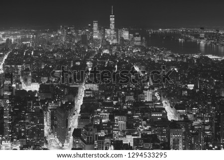 Black and white aerial view of New York City at a hazy night, USA.