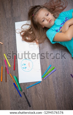 girl draws sadness